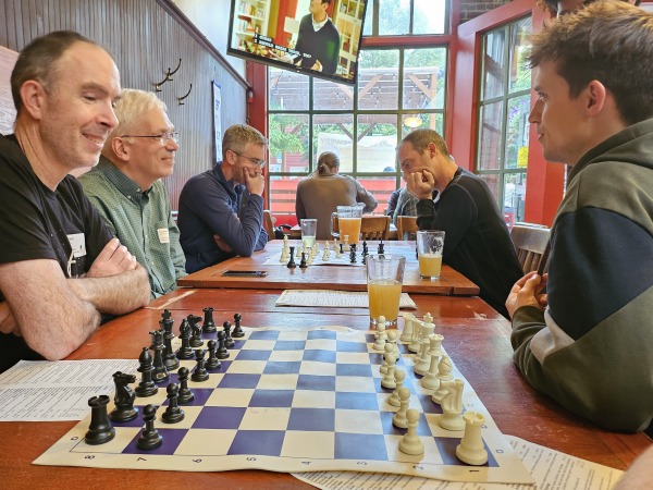 Members of the team playing chess at Big Time Ale Brewery in Seattle